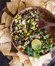 Quick and easy Avocado Dip! Everyone LOVES this fresh mix of avocado, black beans, and corn!