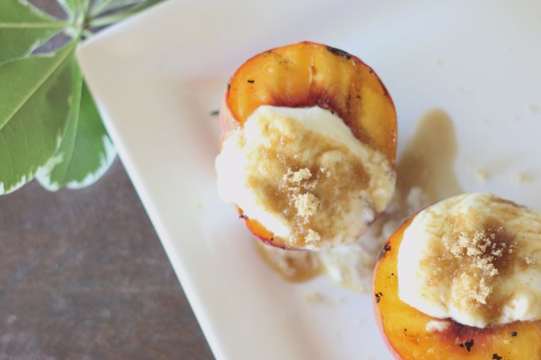 Grilled Peaches With Yogurt Cream on top. 