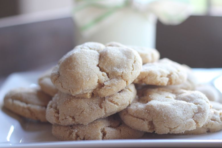 Brown Butter Sugar Cookies stacked on a plate.  