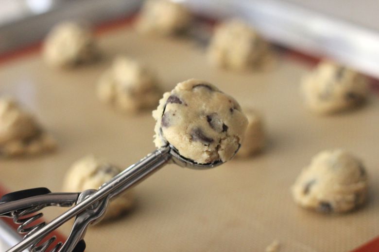 Emilee's Chocolate Chip Cookie dough in a cookie scoop.