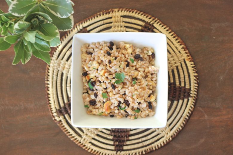 Farro with Cashews and Currants in a serving dish.  