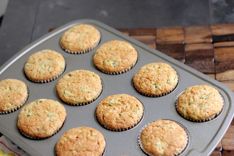Zucchini Almond Cupcakes baked in muffin tin. 