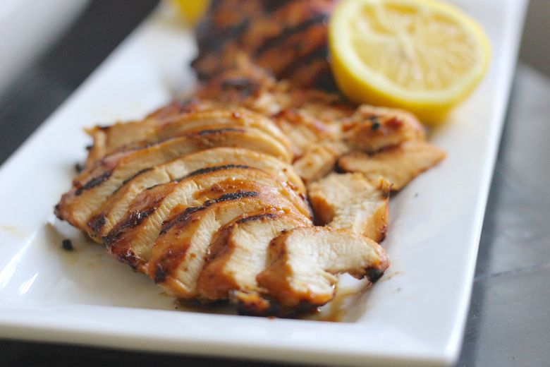 Grilled chicken sliced on a plate.  