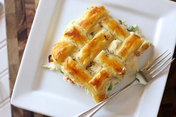 Chicken Pot Pie piece on a plate with a fork. 