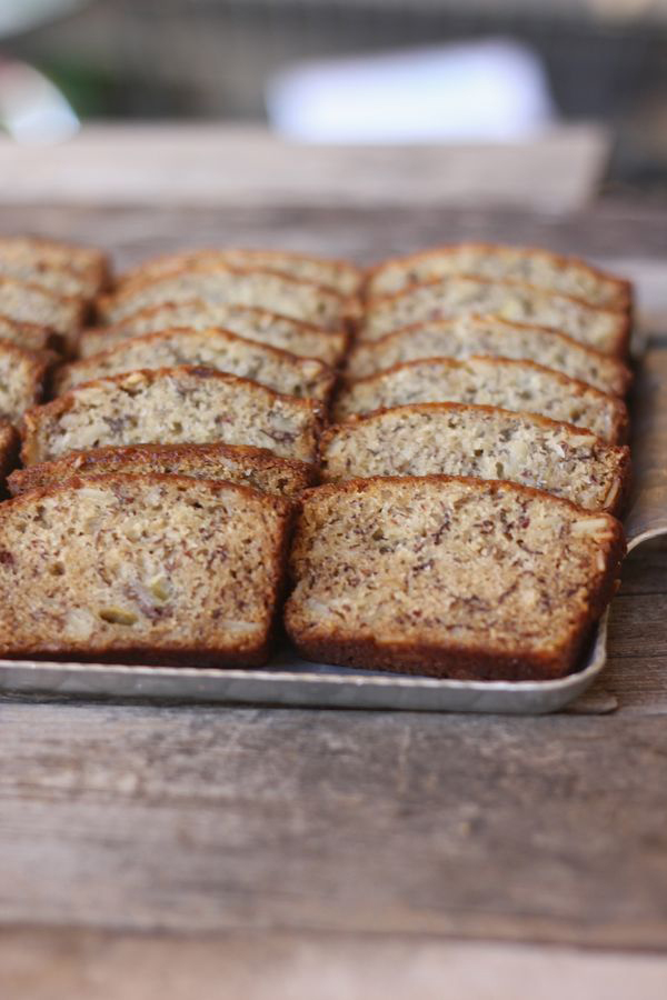 Greek Yogurt Banana Bread sliced and arranged in rows on a serving tray.  