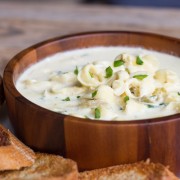 A creamy soup flavored with garlic, artichoke hearts, parmesan cheese, cream cheese, and cayenne pepper