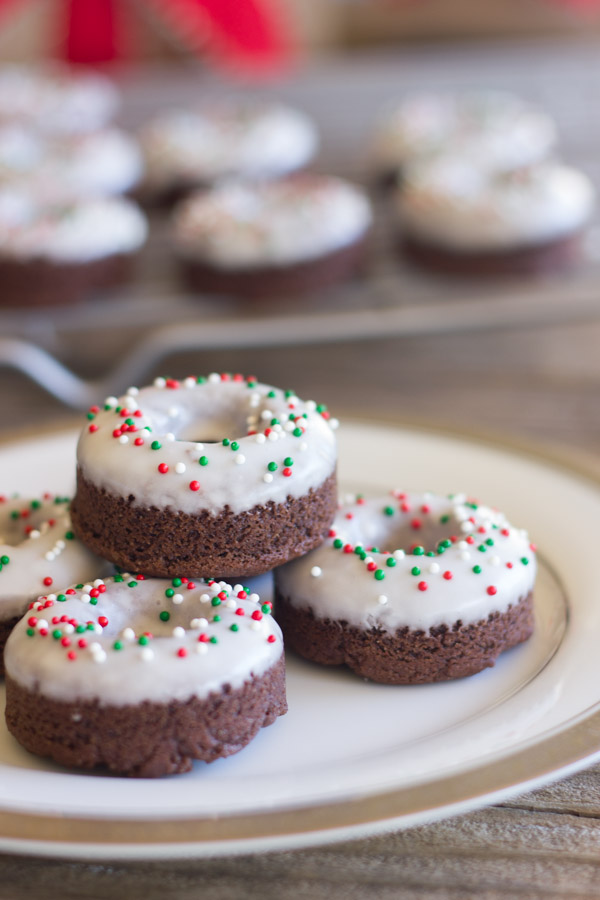 Iced Chocolate Donut Cookies arranged on a plate.  