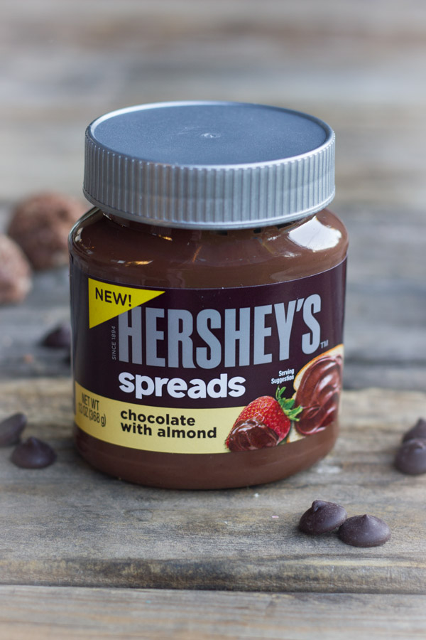 A jar of Hershey's Spreads - Chocolate with Almond flavor.  