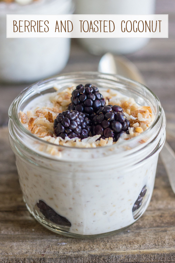 Overnight Steel Cut Oatmeal with berries and toasted coconut in a glass jar.  