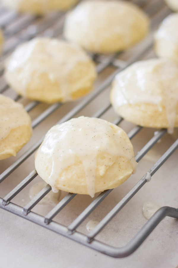Soft Ricotta Cookies With Vanilla Bean Glaze on a cooling rack.  