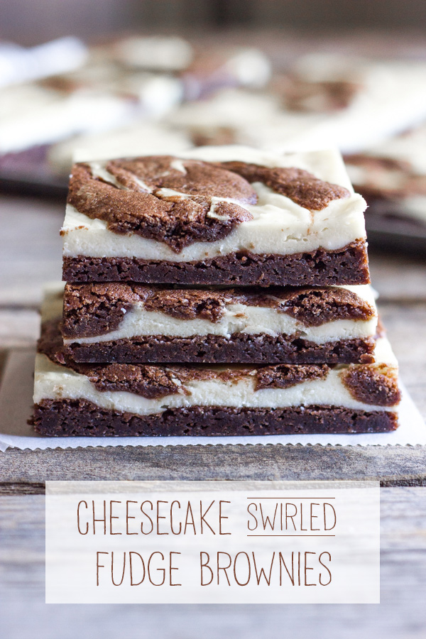 Cheesecake Swirled Fudge Brownies cut in squares and stacked in a pile of three.  