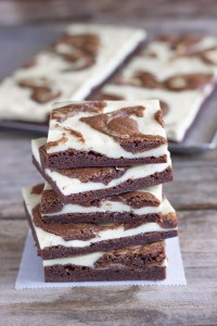 A thin layer of fudge brownies, followed by a layer of classic cheesecake and a brownie swirl.