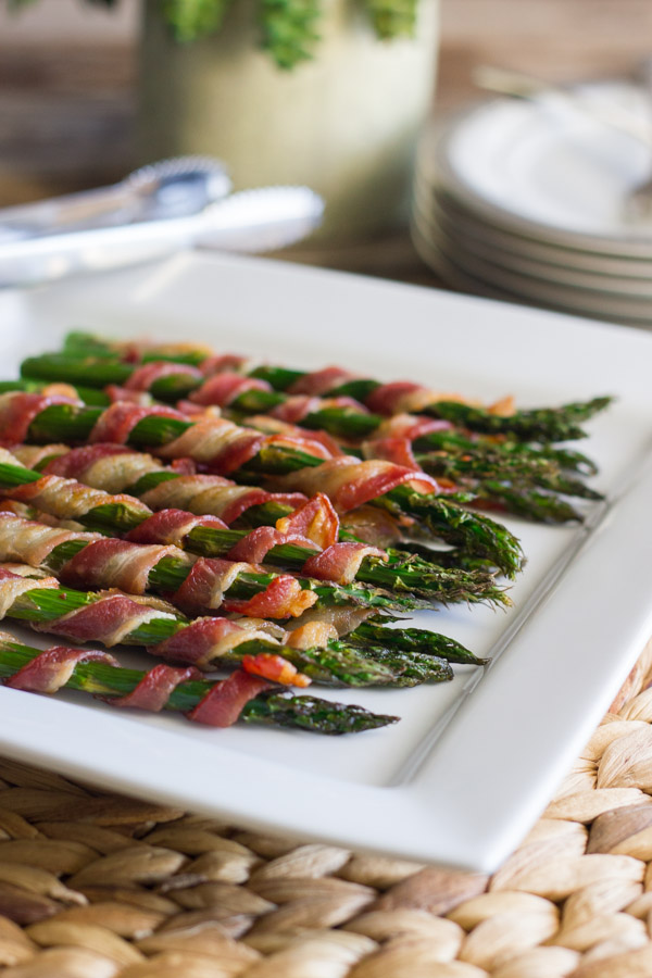 Bacon Wrapped Asparagus on a serving plate.  