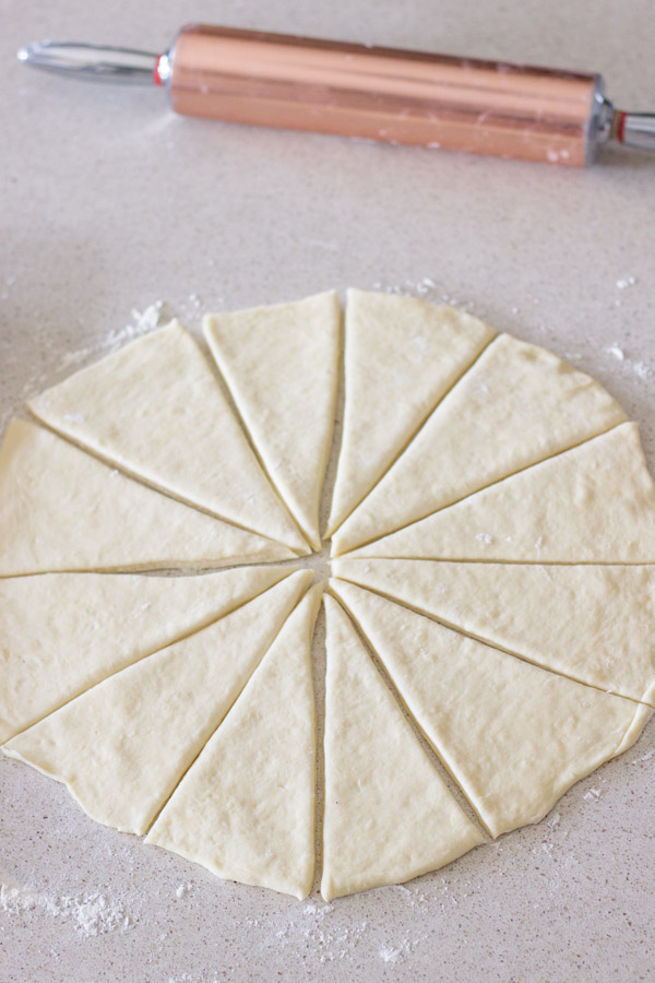 The Best Butterhorn Rolls dough cut into wedges.  