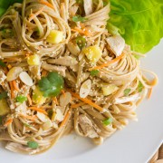 Chicken, sweet mangos, crunchy almonds, and fresh veggies piled high on a bed of sesame noodles.