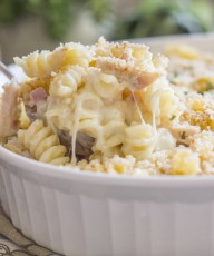 Chicken Cordon Bleu Pasta Bake - creamy pasta, melty swiss cheese, chicken, and ham all baked together and topped with homemade breadcrumbs.