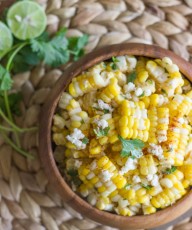 Chili Lime Sweet Corn Salad - sweet corn tossed with butter, fresh lime, chili powder, cilantro, and queso fresco. Amazing!