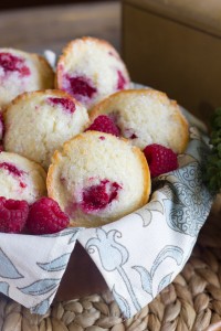 Healthier Raspberry Almond Muffins - tart raspberries tucked into a slightly sweet almond muffin, lightened up with the help of coconut oil and Greek yogurt!