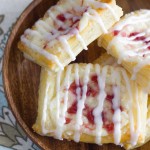 Raspberry Cream Cheese Danish - Sweet, flakey, buttery puff pastries filled with raspberry swirled cream cheese!
