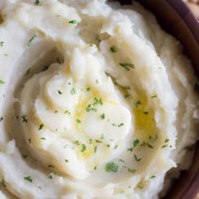 Easy Creamy Crockpot Roasted Garlic Mashed Potatoes - perfectly fluffy and creamy!