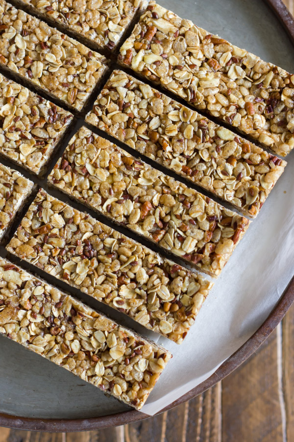 Healthy Chewy Apple Cinnamon Granola Bars on a piece of parchment paper.  