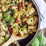 One Skillet Chicken Tortellini - pesto, sun-dried tomatoes, toasted pine nuts, and spinach. It's VERY easy to put together, and has SO much flavor!