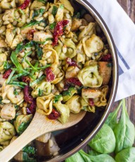 One Skillet Chicken Tortellini - pesto, sun-dried tomatoes, toasted pine nuts, and spinach. It's VERY easy to put together, and has SO much flavor!