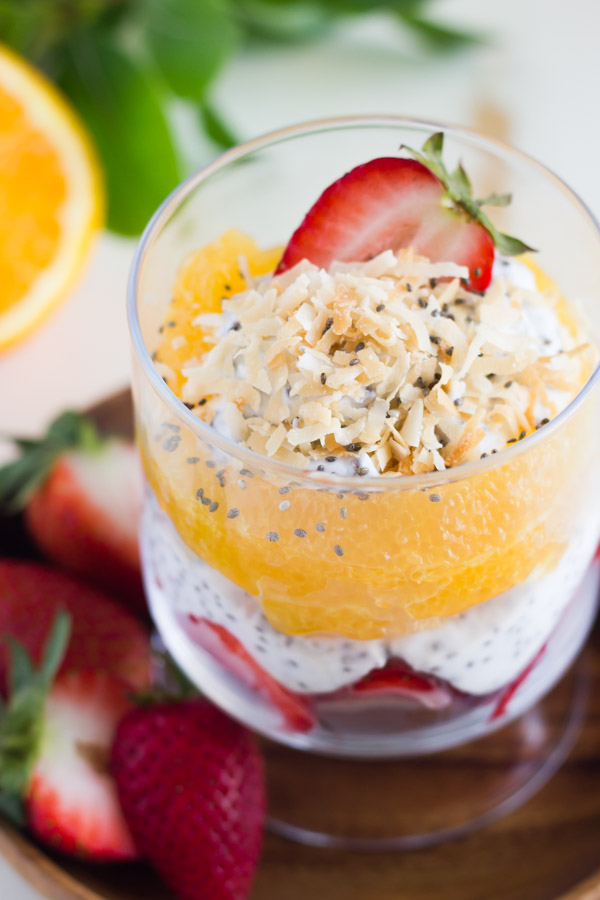 Toasted Coconut Chia Yogurt Fruit Parfait in a glass cup.  