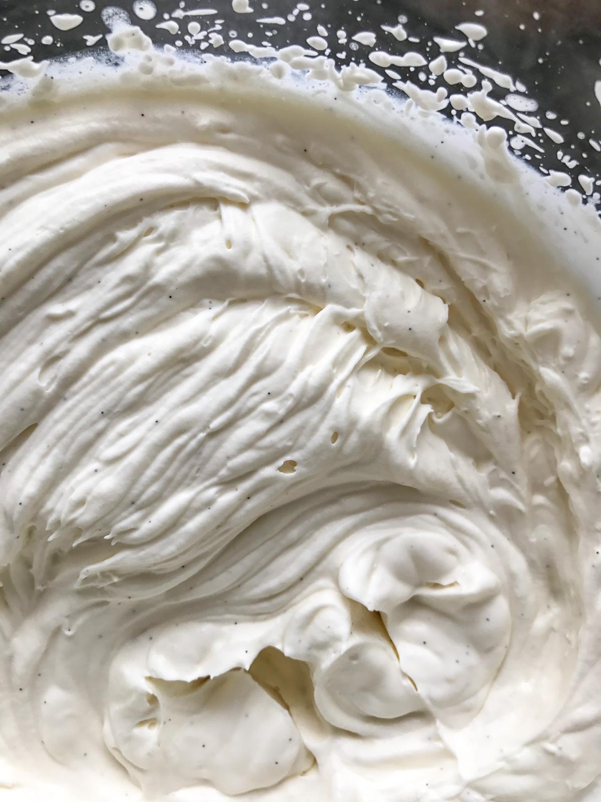 Homemade whipped cream in a bowl.  