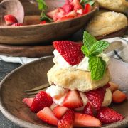 These Homemade Strawberry Shortcakes have a slightly sweetened fluffy buttermilk biscuit with red ripe strawberries and freshly whipped cream!