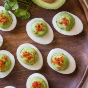 Smoky Bacon Avocado Deviled Eggs - A great way to spice up your traditional Easter menu.