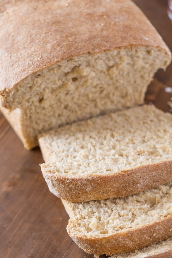 Easy Honey Whole Wheat Bread loaf that has been sliced.  