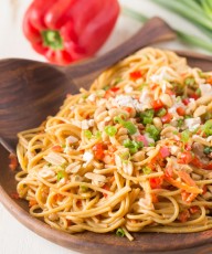 Easy Spicy Peanut Noodles With Chicken - Some pantry staples, a few fresh veggies and the help of a rotisserie chicken make this quick and easy dinner a huge hit!