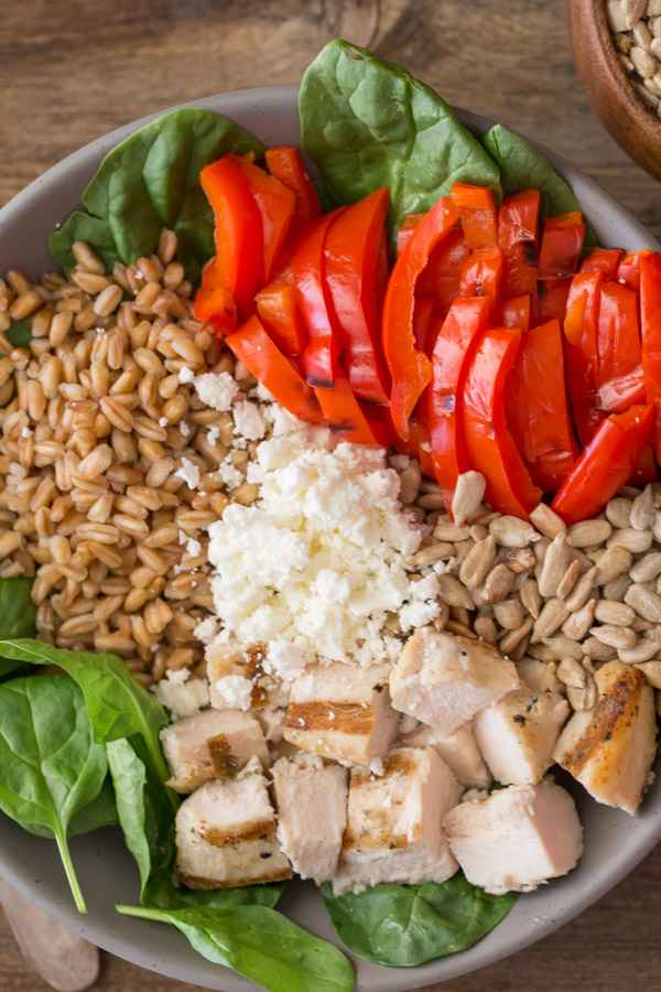 Grilled Chicken and Red Pepper Power Bowl ingredients arranged in a bowl.  