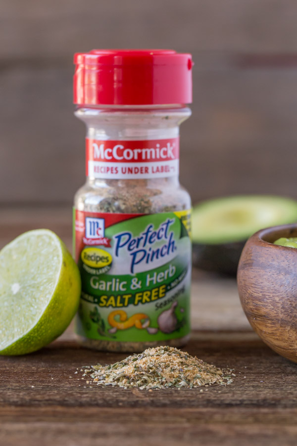 A container of McCormick Perfect Pinch Garlic and Herb Seasoning.  
