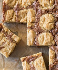 Peanut Butter Cookie Brownies - An easy homemade brownie batter studded with globs of peanut butter cookie dough for a chocolate peanut butter lovers dream come true.