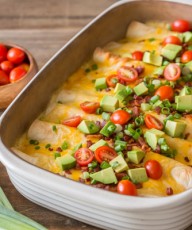 Breakfast Enchilada Bake - A super hearty, ultimate breakfast enchilada bake filled with eggs and cheese that can be served any time of the day.
