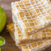 Iced Apple Pie Bars - Perfectly spiced squares of apple pie with crisscross icing on top!