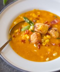 Butternut Squash Corn Chowder With Goat Cheese Croutons - A wonderfully balanced recipe with sweet corn, smokey bacon, chipotle peppers, and creamy goat cheese. Everyone will want to go back for more!