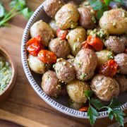 A quick and easy alternative to your typical potato salad, these Roasted Baby Potatoes are tossed with roasted tomatoes and homemade pesto!