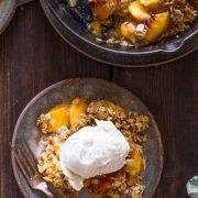 Just sweet, warm peaches with a blanket of crunchy, buttery oats and almonds. Easier than pie!