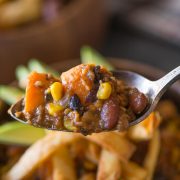 A hearty sweet potato chili with black beans, sausage and corn that'll fill you up and keep you going all winter long. Just the right amount of sweet and spicy!