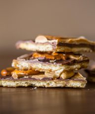 This Take Five Cracker Bark has a butter cracker base with layers of caramel, chocolate, peanut butter, pretzels and peanuts! So delicious and addicting!
