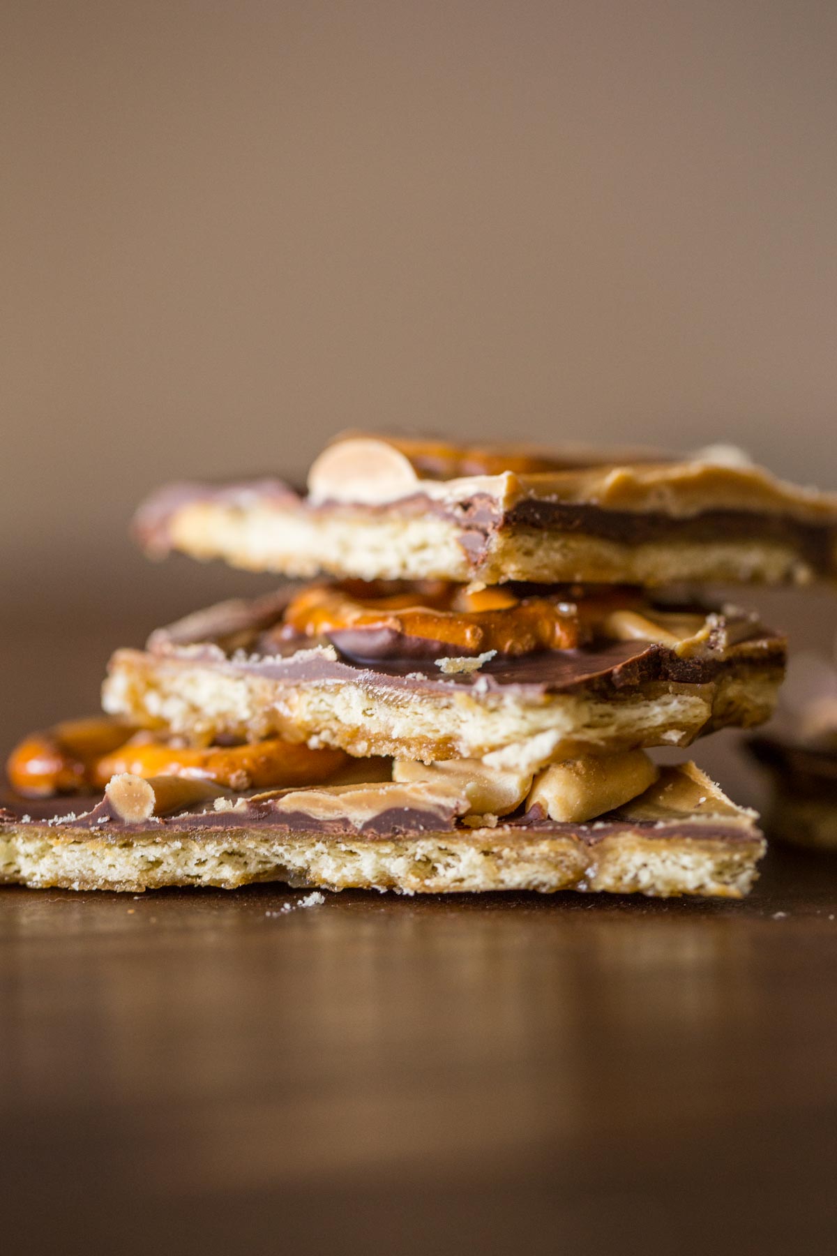Take Five Cracker Bark pieces stacked on top of each other. 