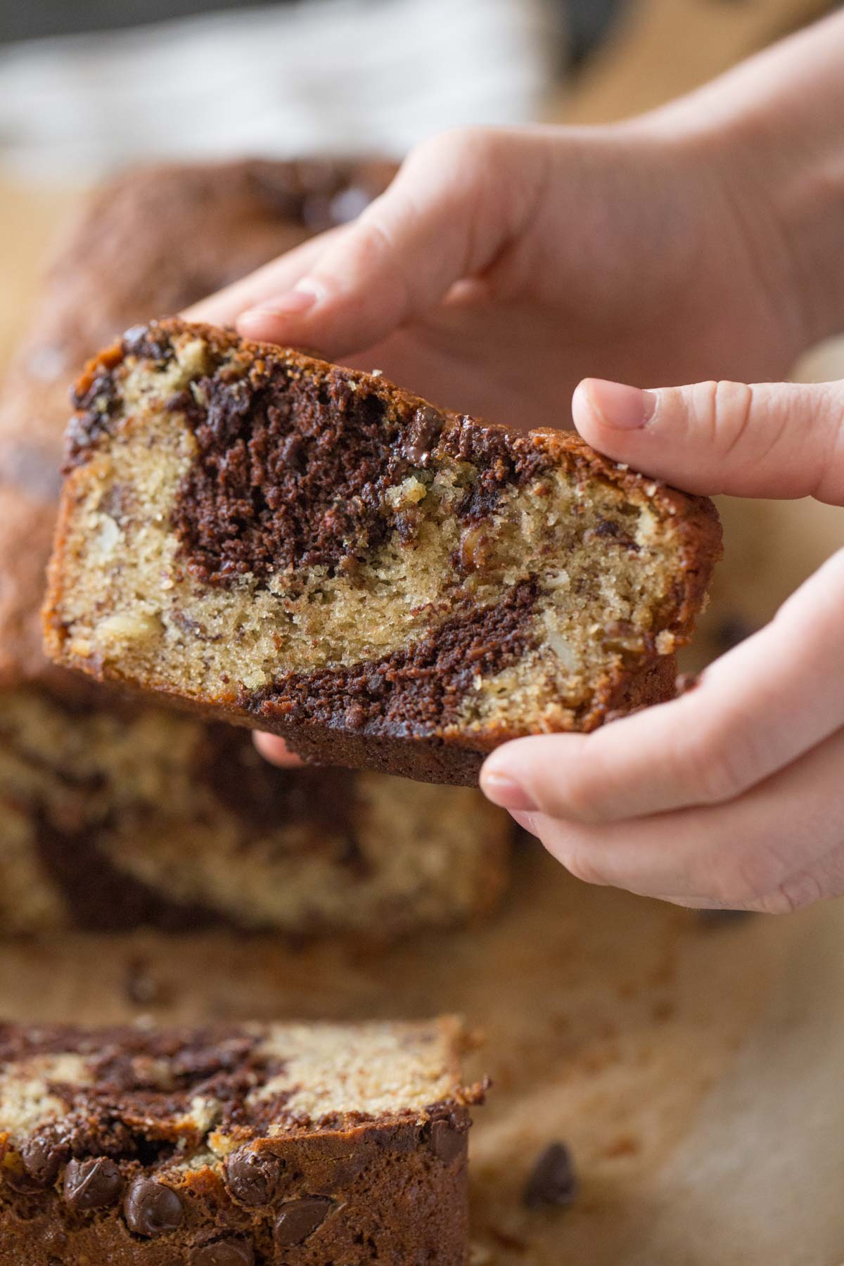 A slice of Marbled Chocolate Banana Bread.  