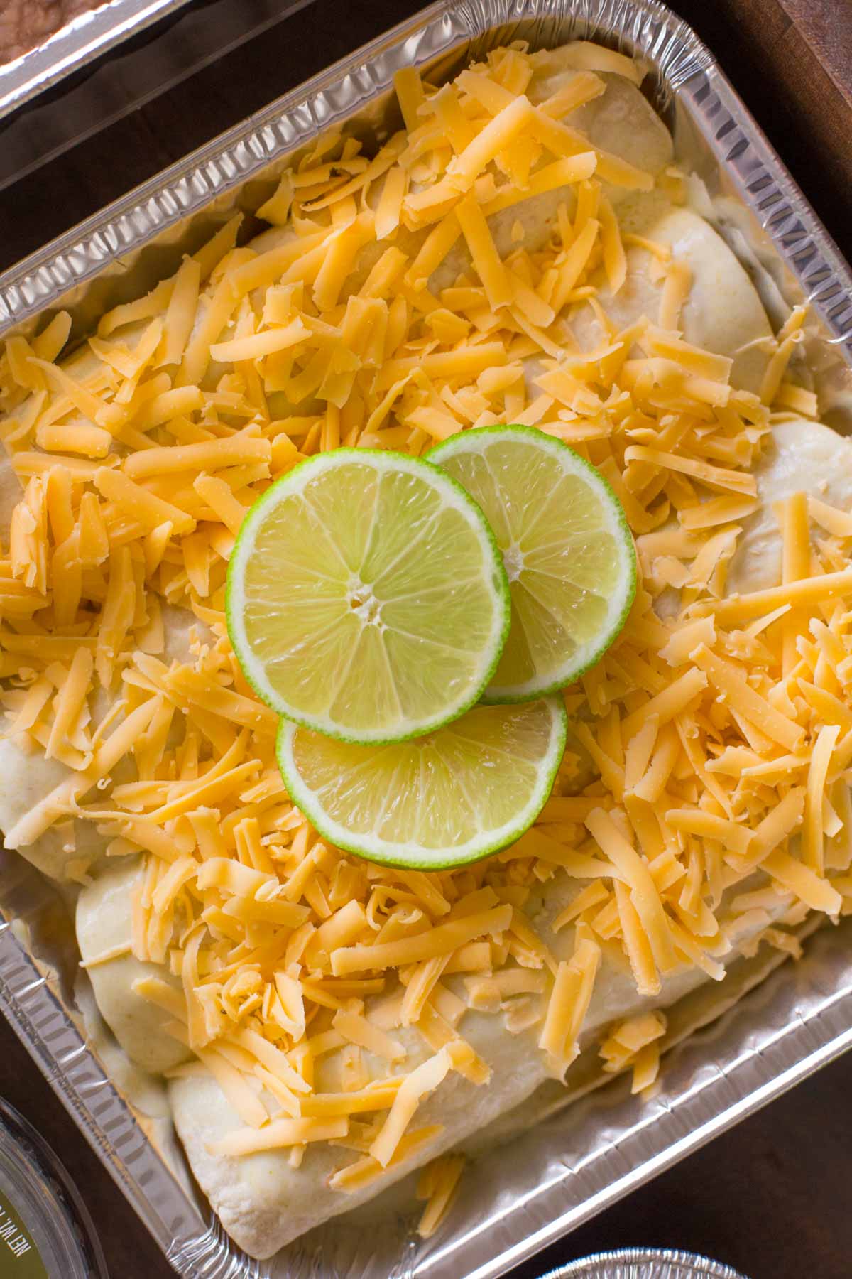 A pan of Honey Lime Chicken Enchiladas before being cooked.  