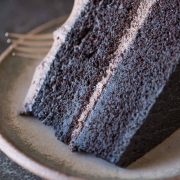 This super moist and decadent Dark Chocolate Cake With Whipped Cream Frosting made a cake lover out of me! Try it and you'll see!