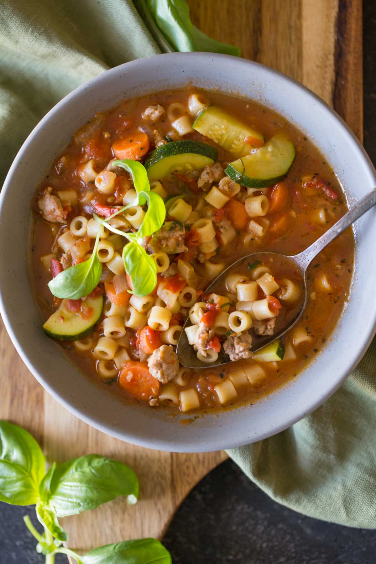 Turkey and Vegetable Ditalini Soup in a bowl with a spoon.  