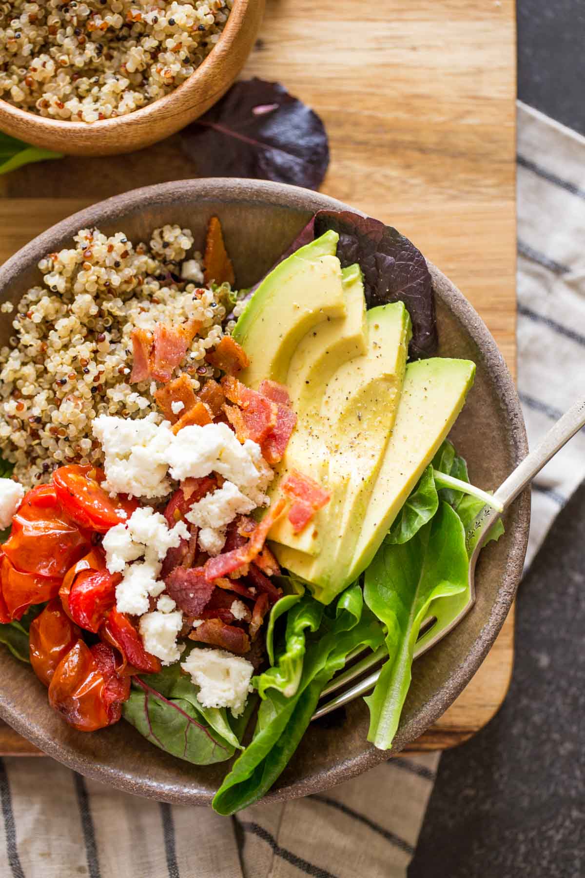 A BLT Bliss Bowl and a small bowl of quinoa. 