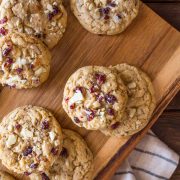 I ADORE these Cranberry Almond White Chocolate Chunk Cookies! They bake up thick and chewy, with a rich, sweet buttery flavor studded with tangy bits of cranberry!